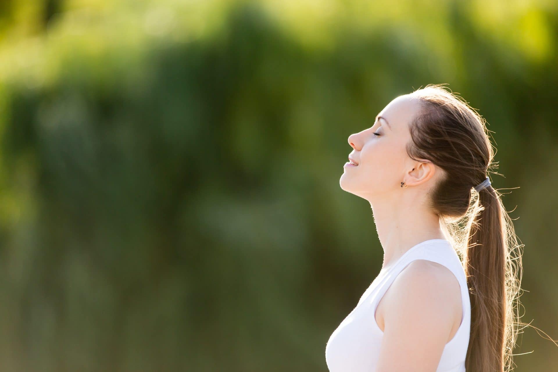 Woman standing in the sun