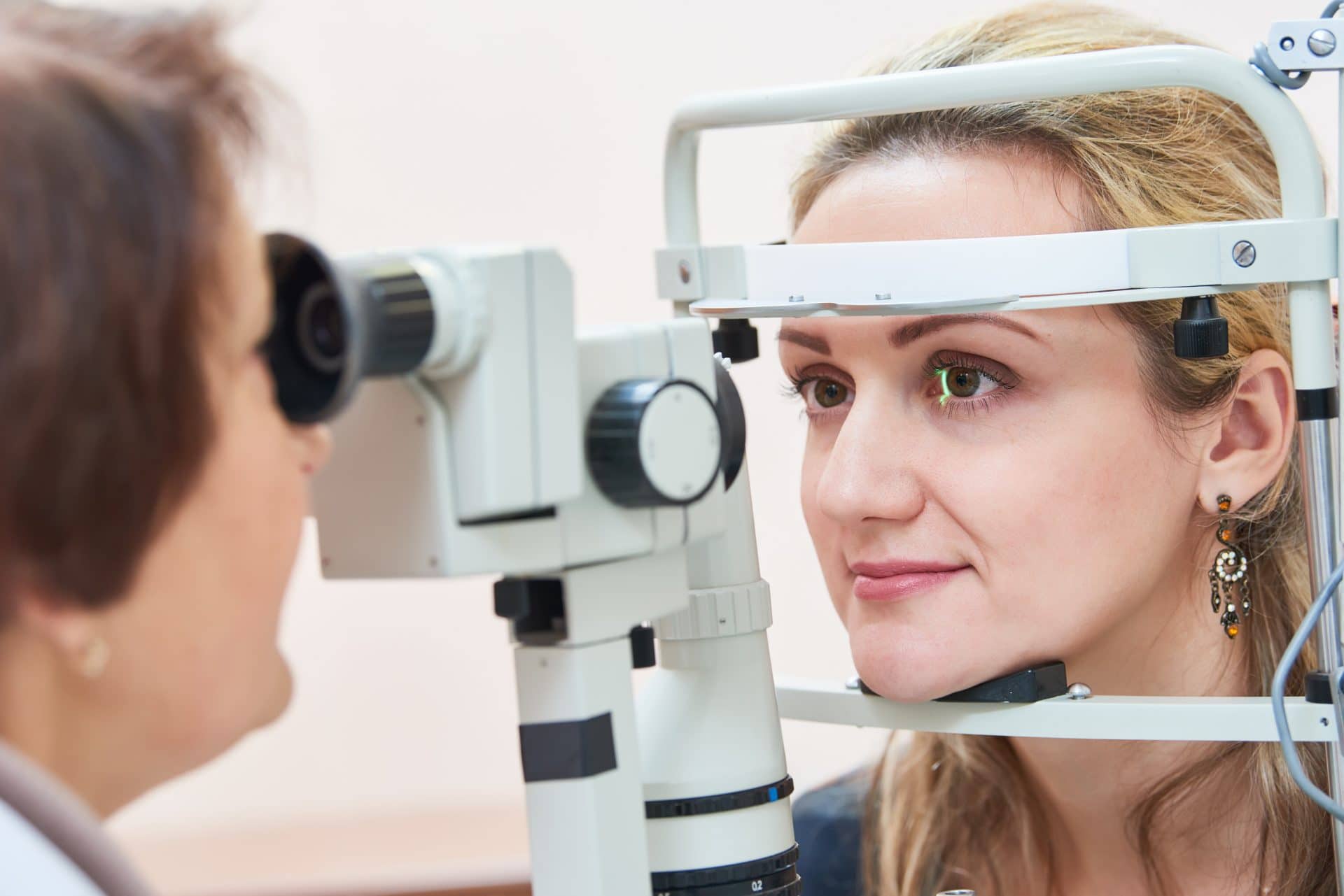 Woman having an optometrist eye check