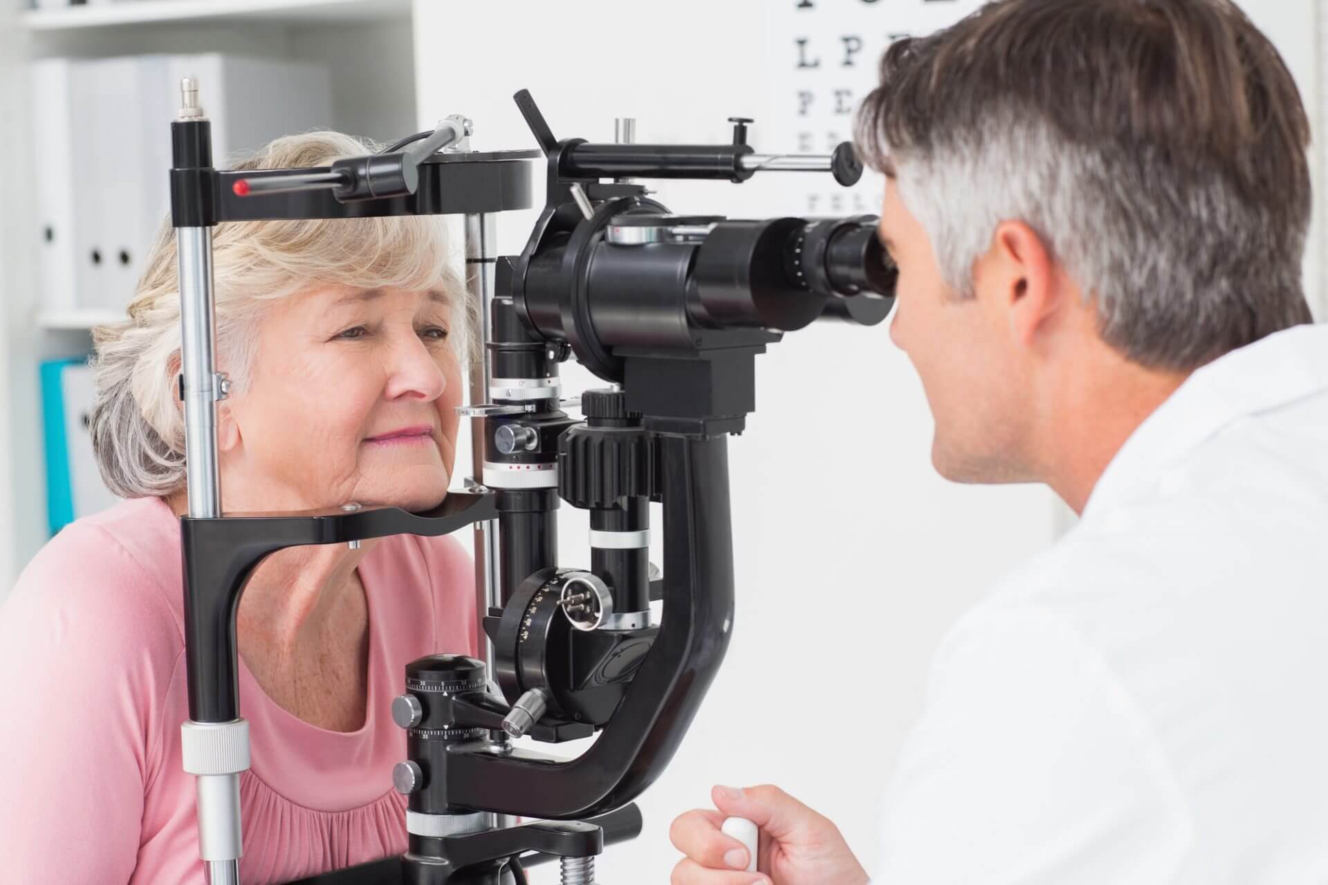 Elderly woman having her eyes tested