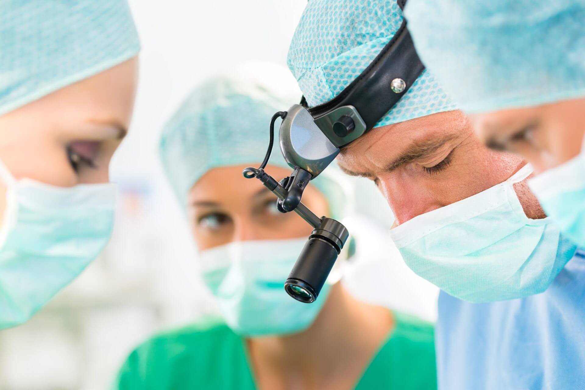 Eye surgeons operating on a patient