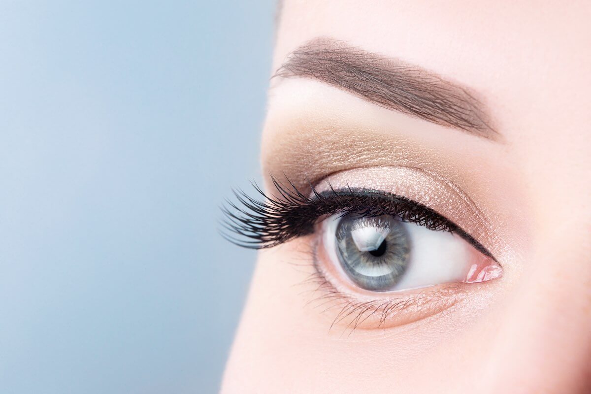 Close up of woman's eye with long eyelashes