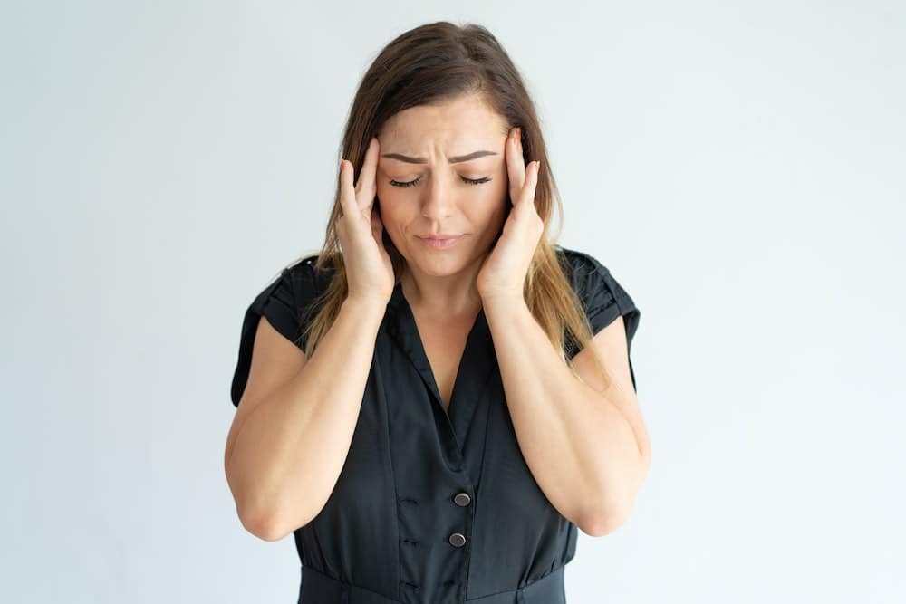 Woman Experiencing Headache