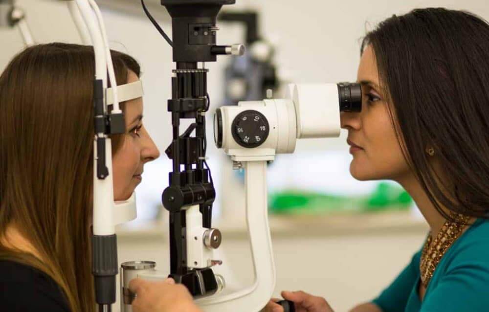 Woman having her eyes examined