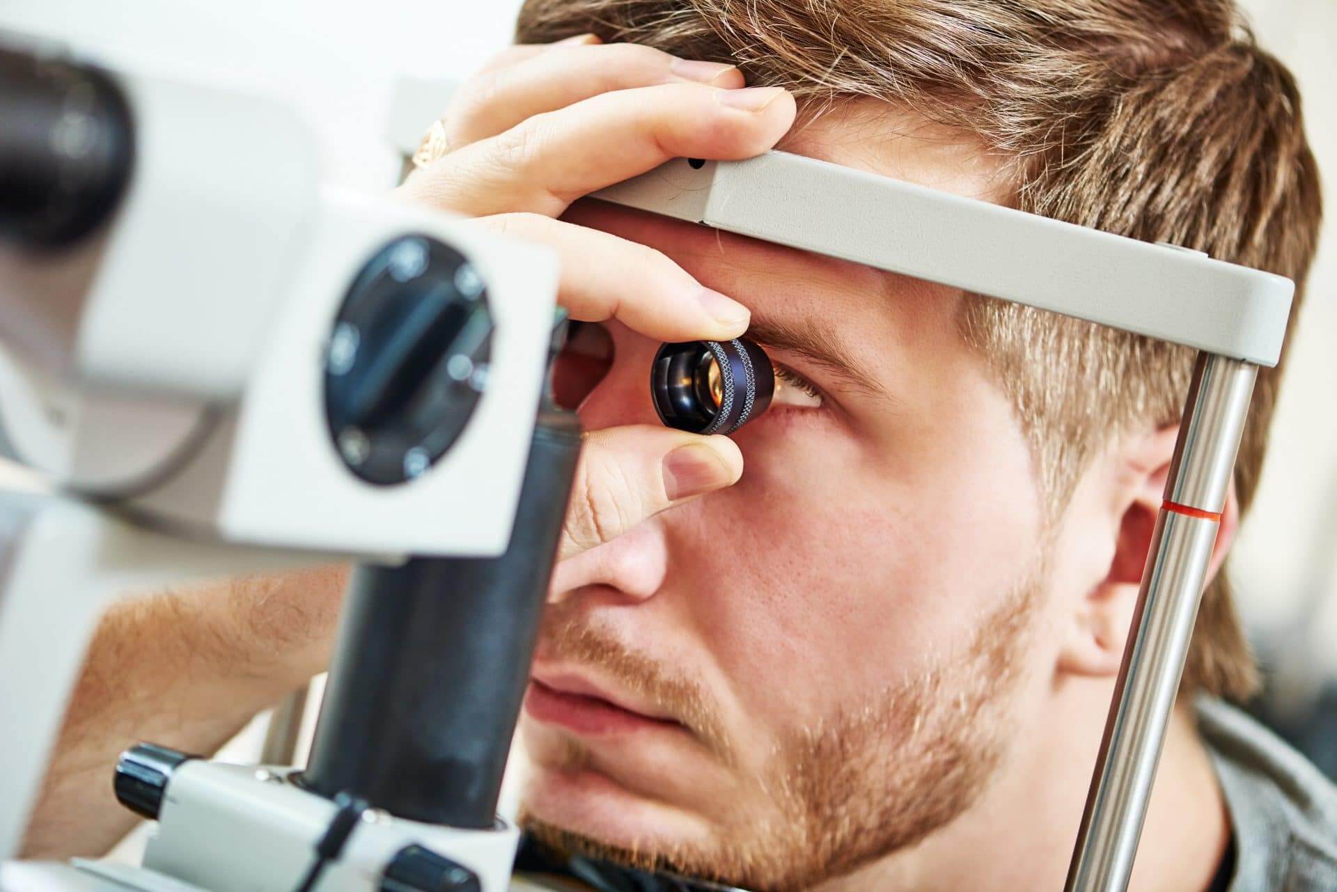 Man having his eye examined