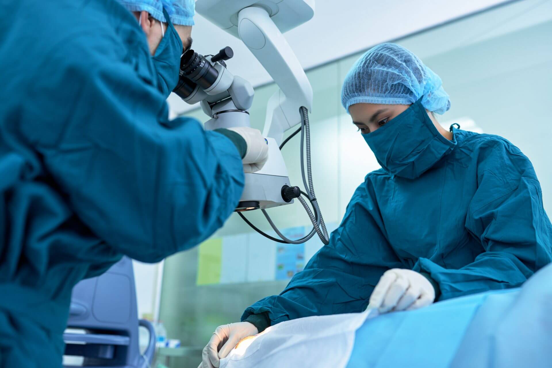 Eye surgeons working on a patient